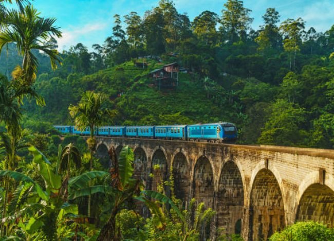 Iconic train passing over Nine Arch Bridge in Demodara, Ella, Sri Lanka